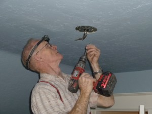 Sam Harding installs new fixtures